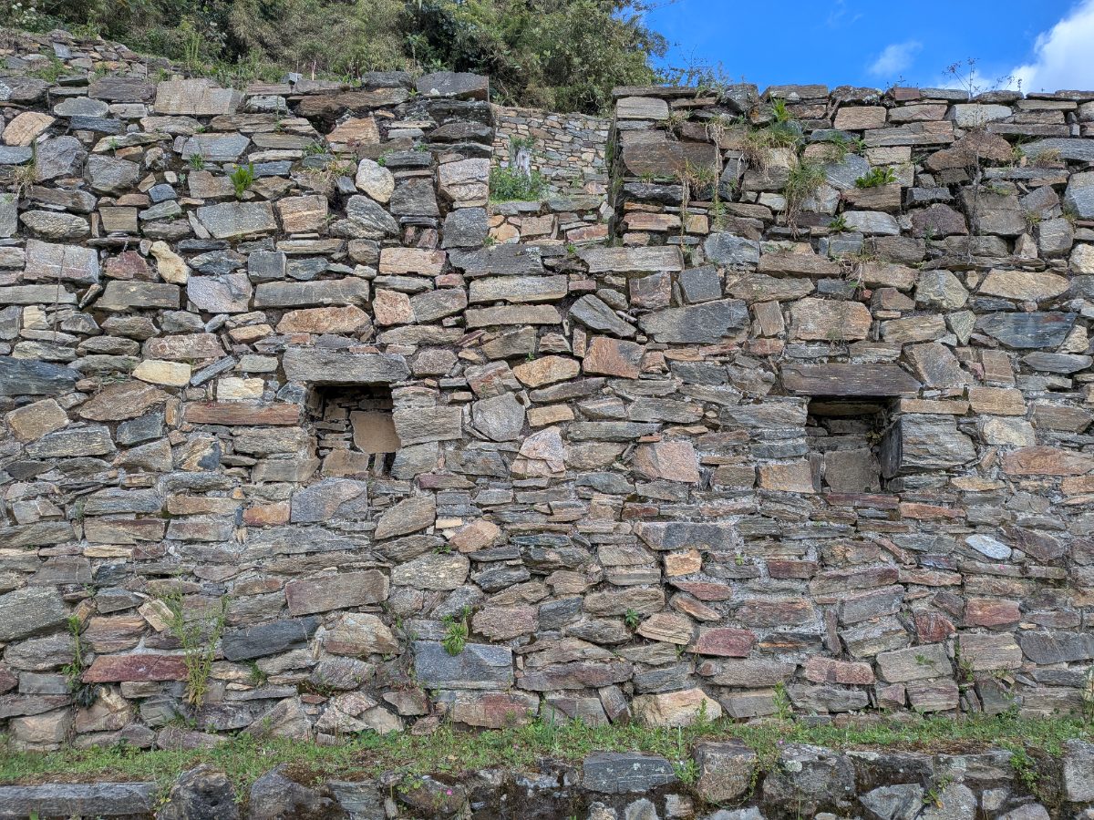 A well-preserved Inca stone wall at the Choquequirao ruins
