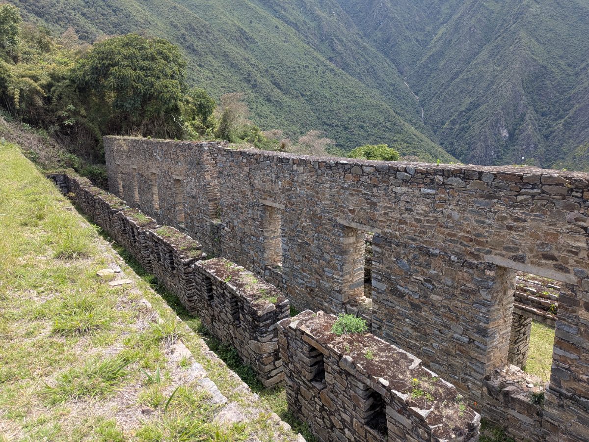 Terraced stone walls climbing the steep slopes of Choquequirao