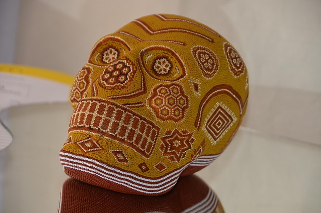 Wixárika artists bead intricate yarn and glass patterns onto wood, a craft now sold worldwide.