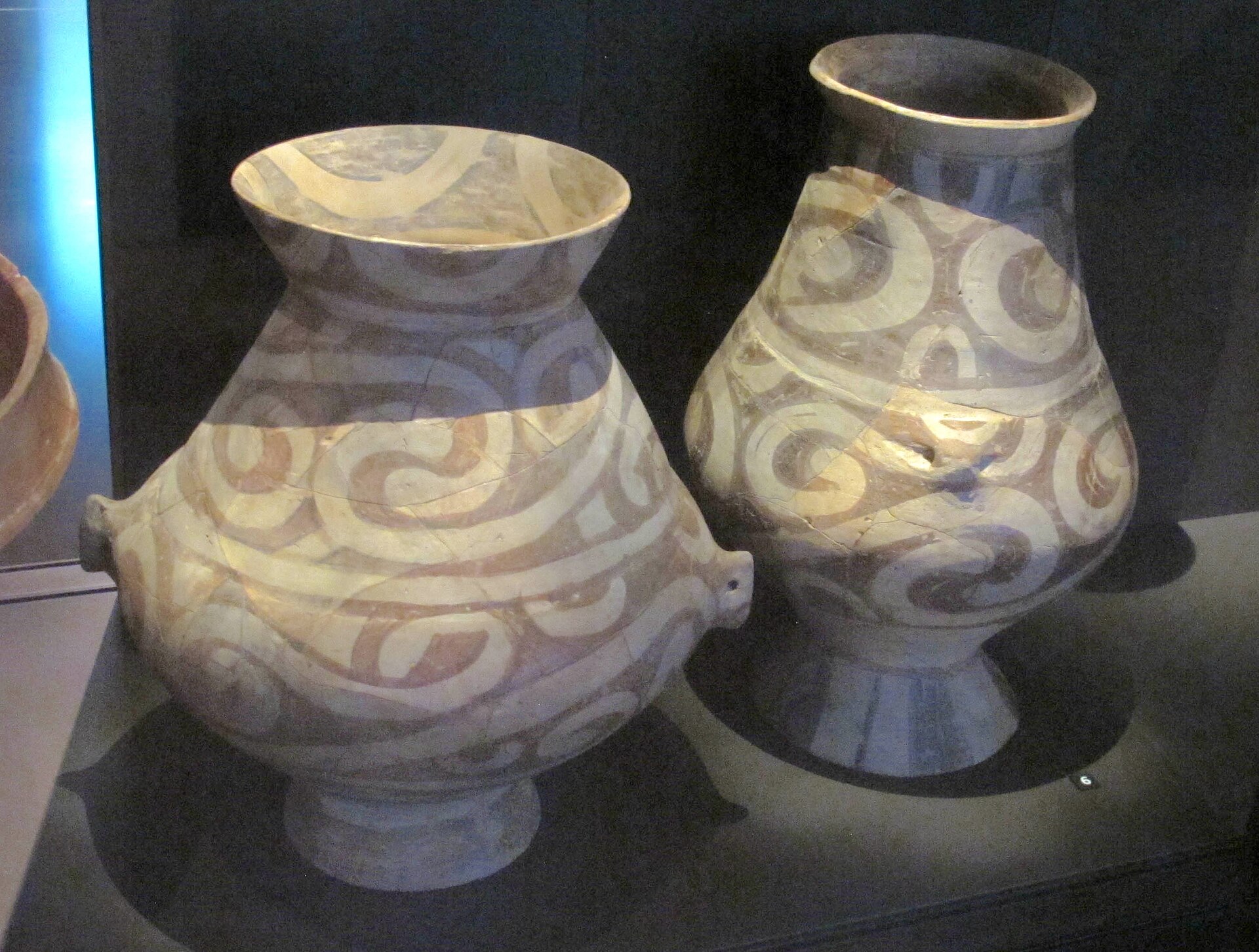 Two painted Cucuteni-Trypillia jars. Their spiralling designs are among the finest ceramics of the Neolithic world.