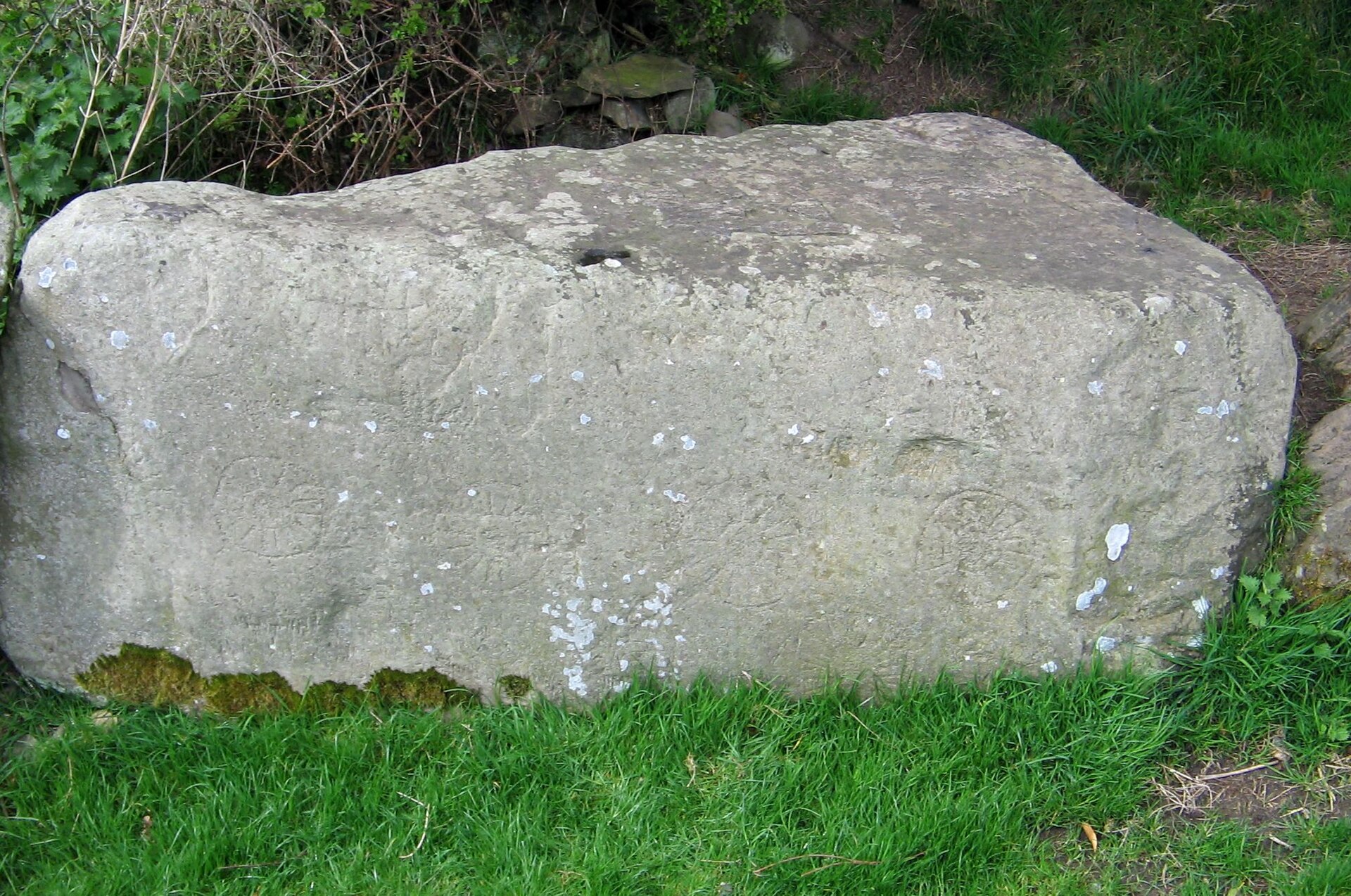 The kerbstone known as the Stone of the Seven Suns, carved with radiating motifs
