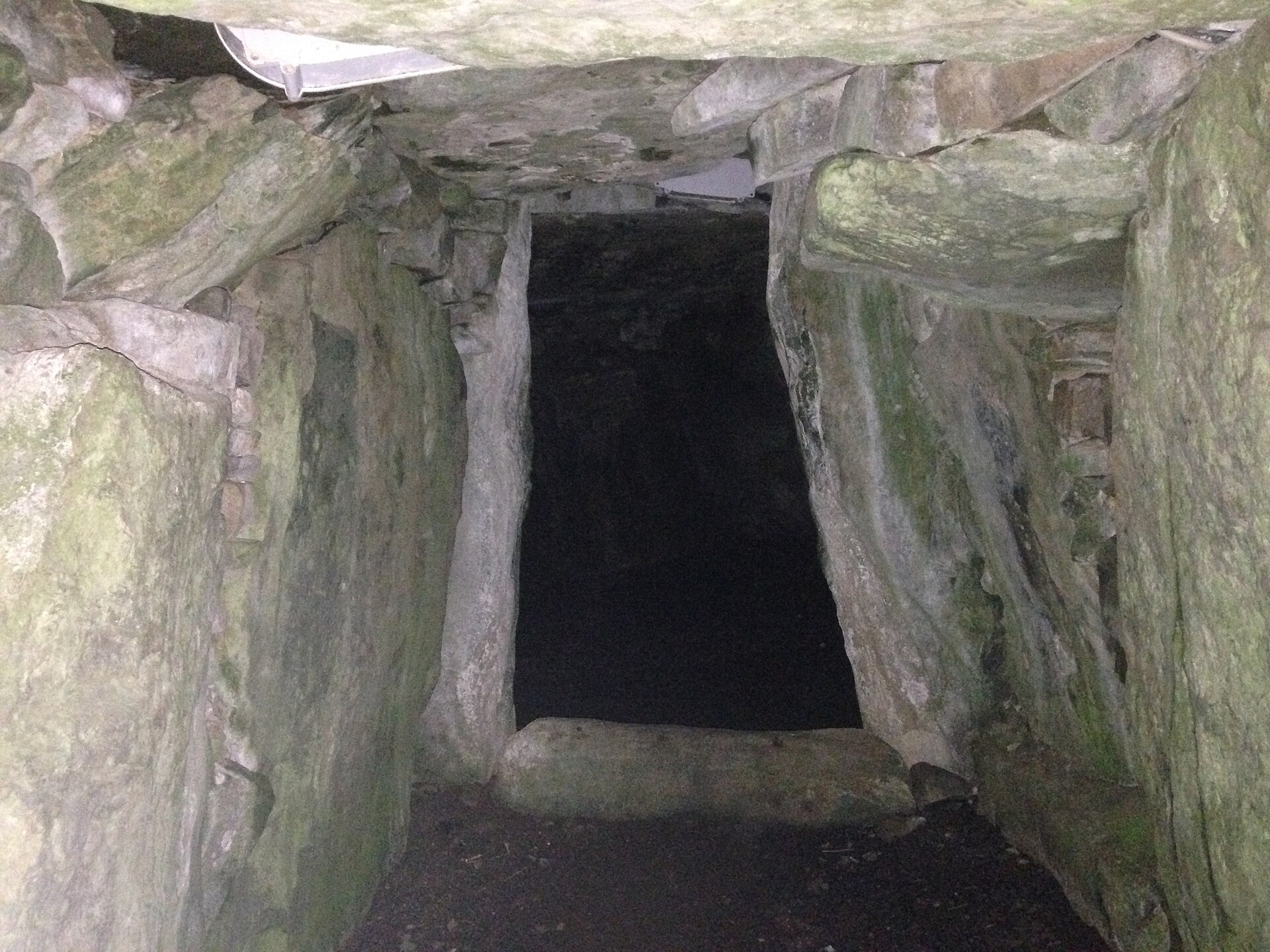The stone-framed entrance leading into one of Dowth’s passages