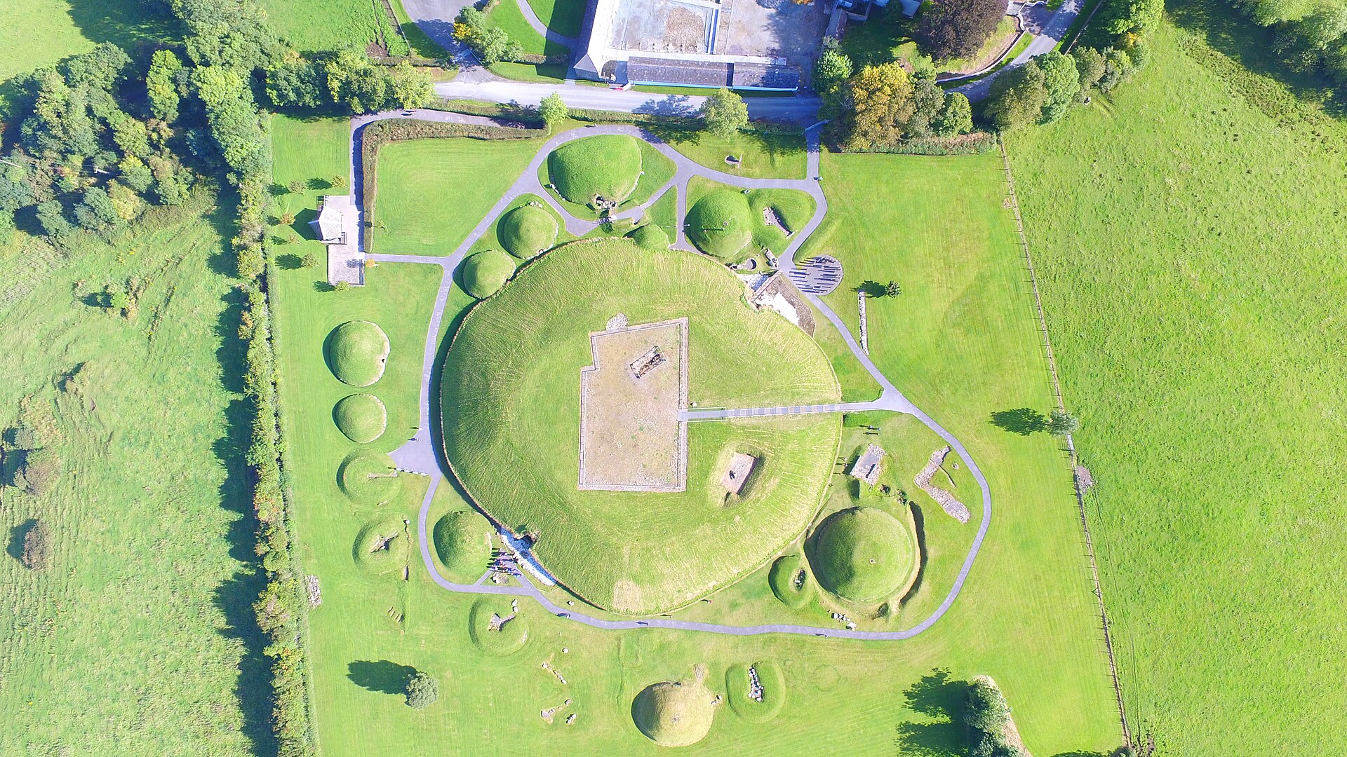 A view along the mound with the surrounding green fields