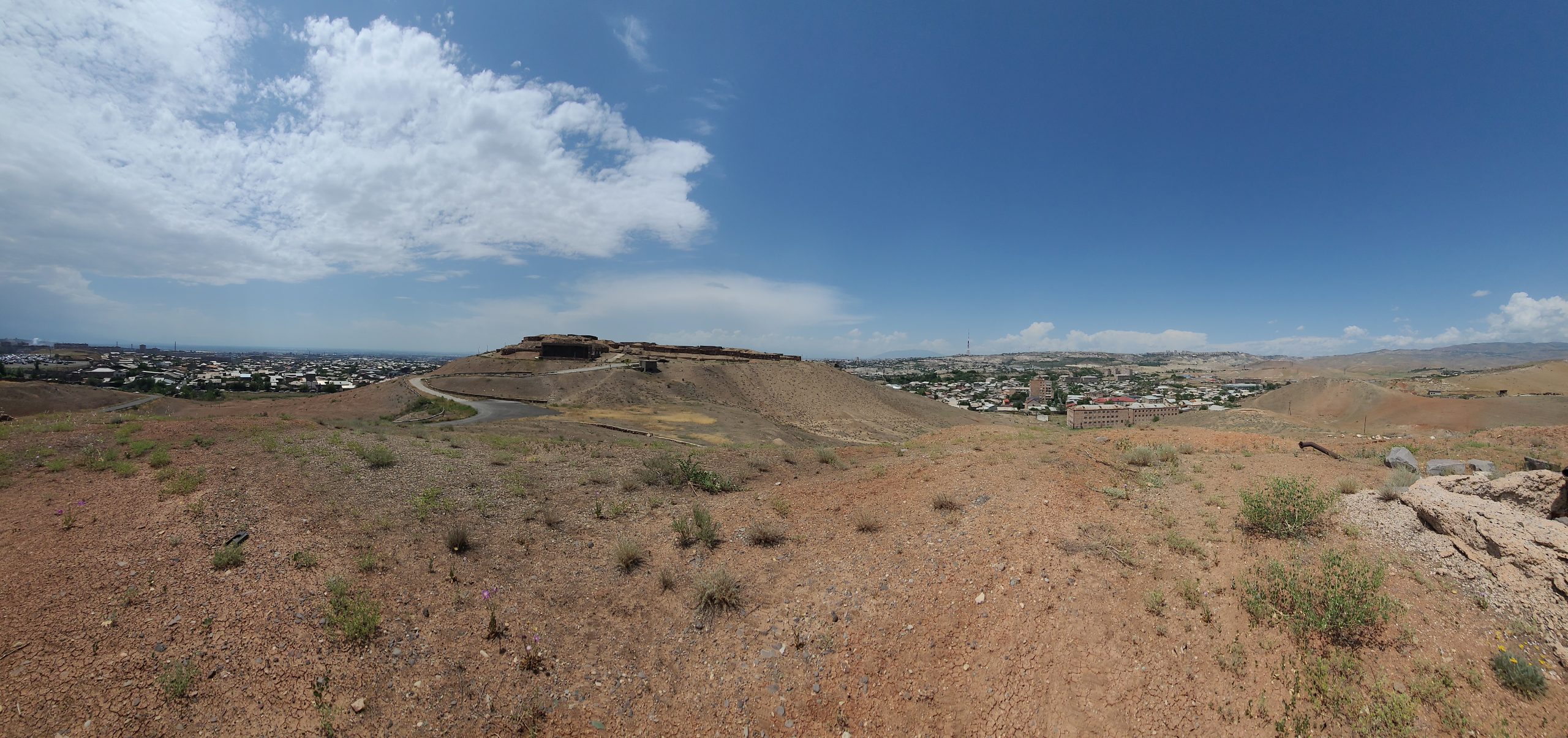 Walls of the Erebuni fortress under a clear sky