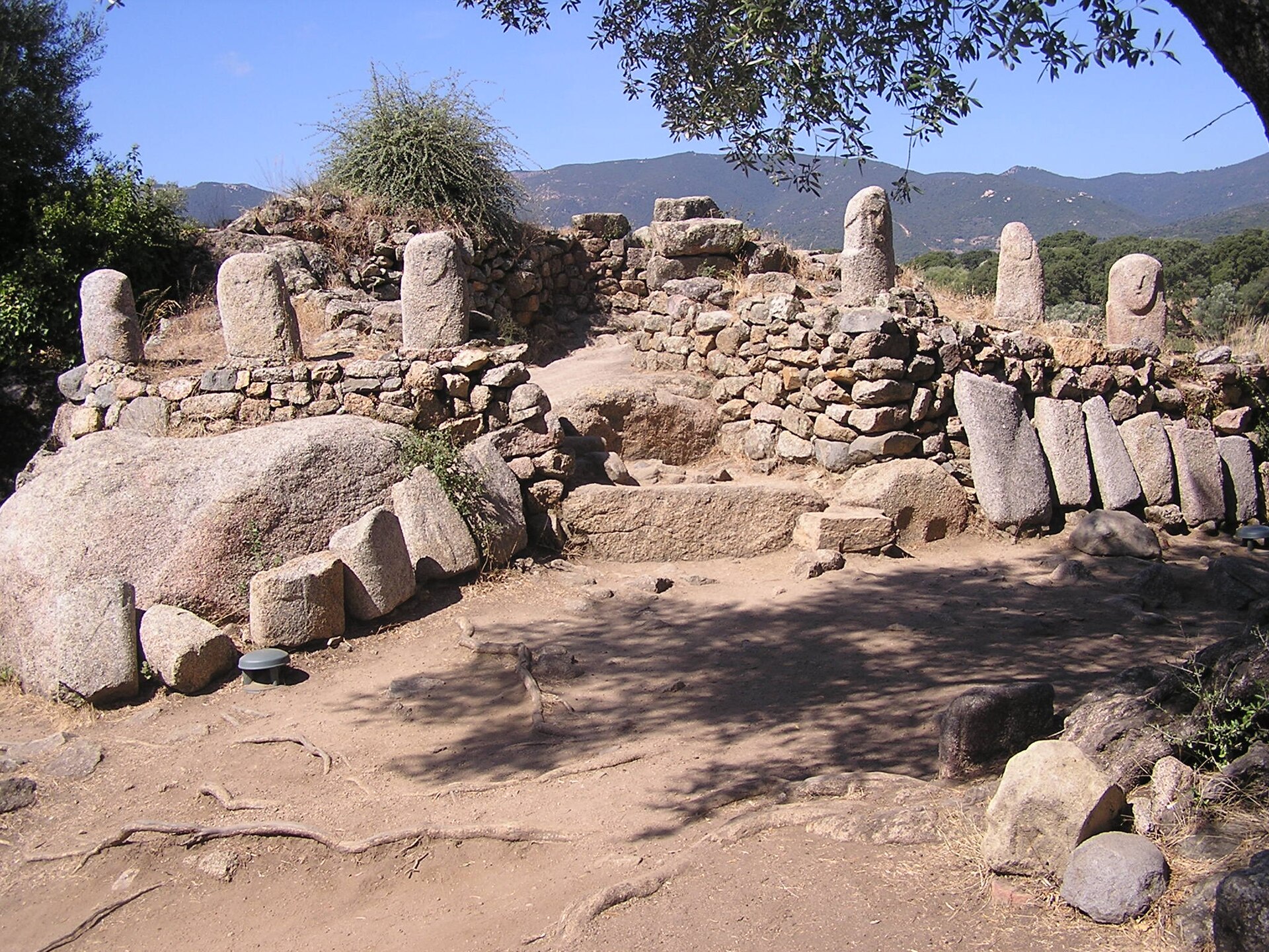 The central monument where broken statue-menhirs were reused as building stone