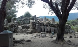 Fragments of ancient carved figures set into the central structure
