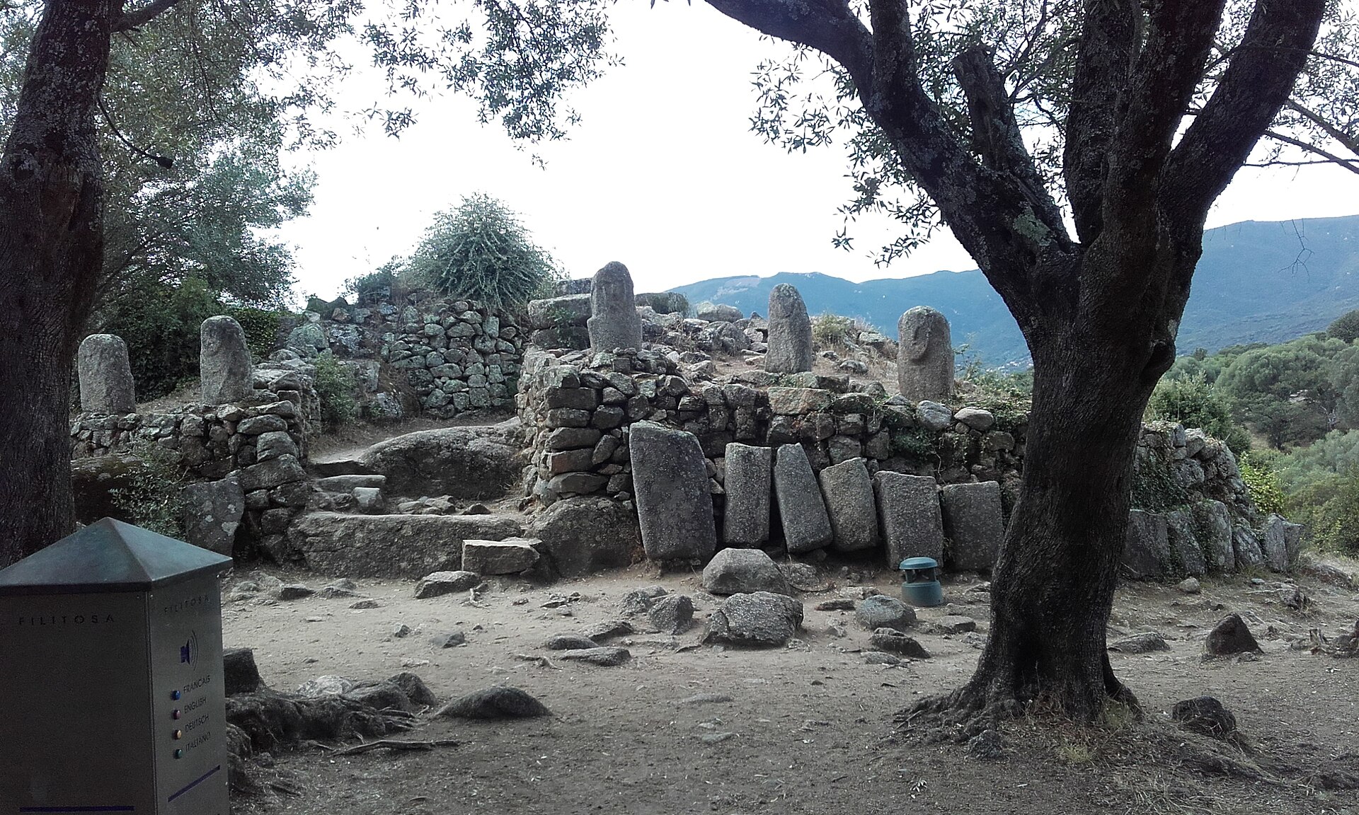 Fragments of ancient carved figures set into the central structure