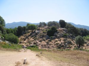 The old hilltop settlement seen from beside the five menhirs