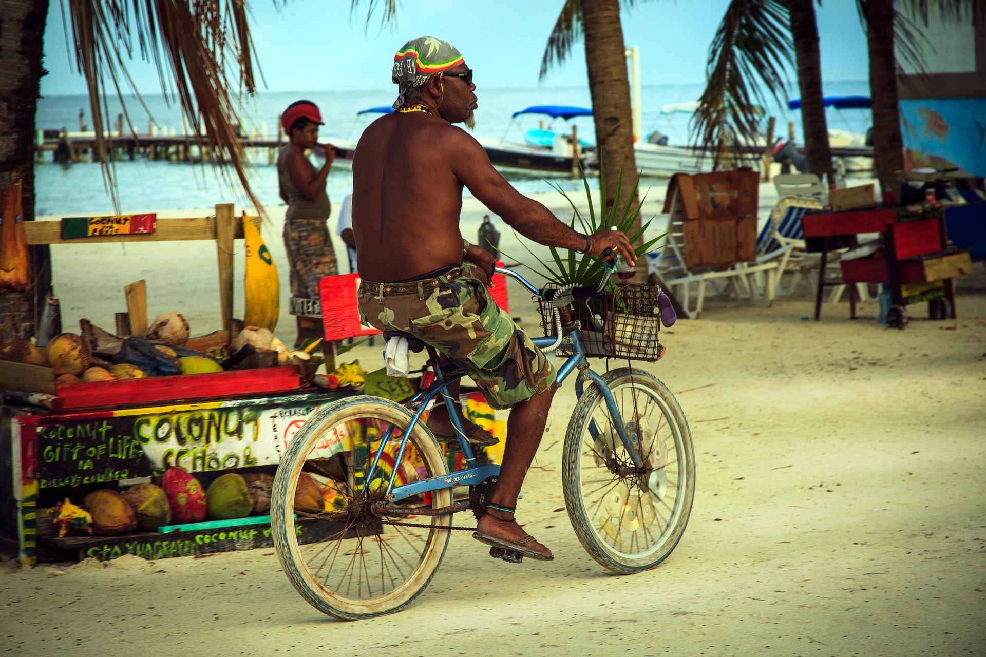 Daily life along the Belize coast, where Garifuna communal customs remain strong