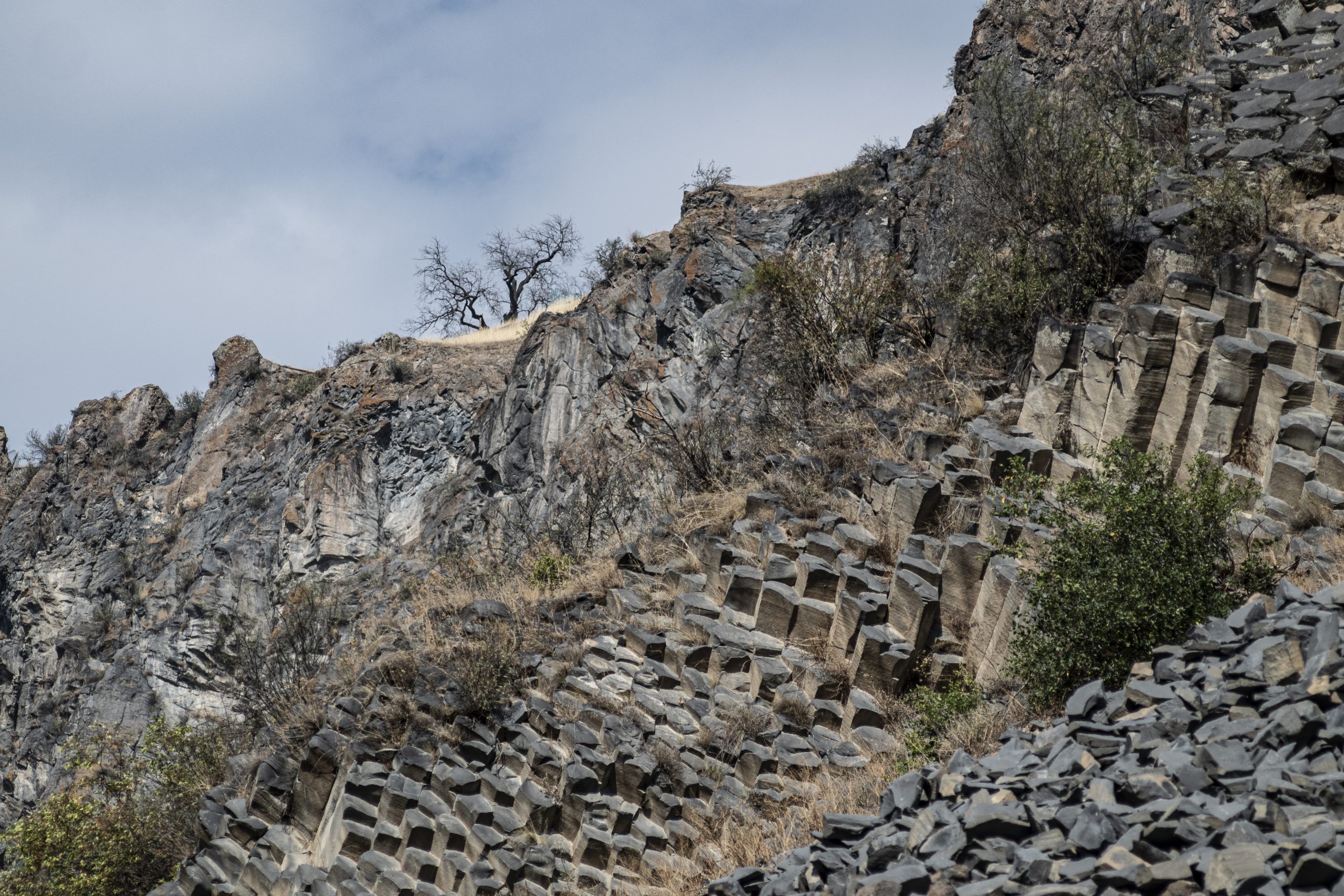 A single tall basalt column formation at Garni