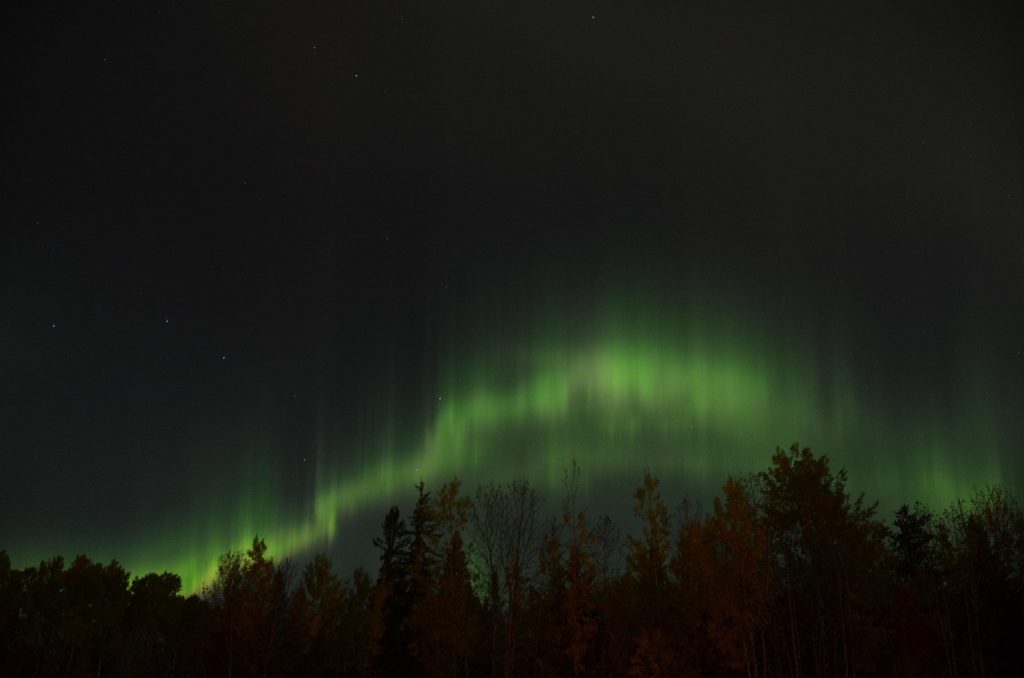 Stories explaining the northern lights are told across generations of Inuit families.