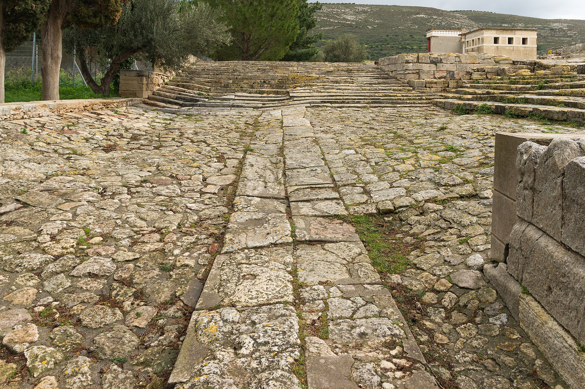 The open theatral area at Knossos, a stepped public space that once hosted gatherings and ceremonies before the Minoan world declined.