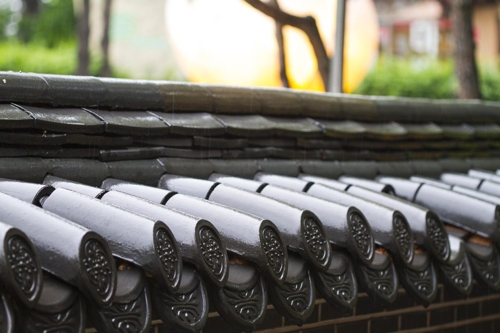 The curved tiled roofs of the hanok, a signature of Korean craft.