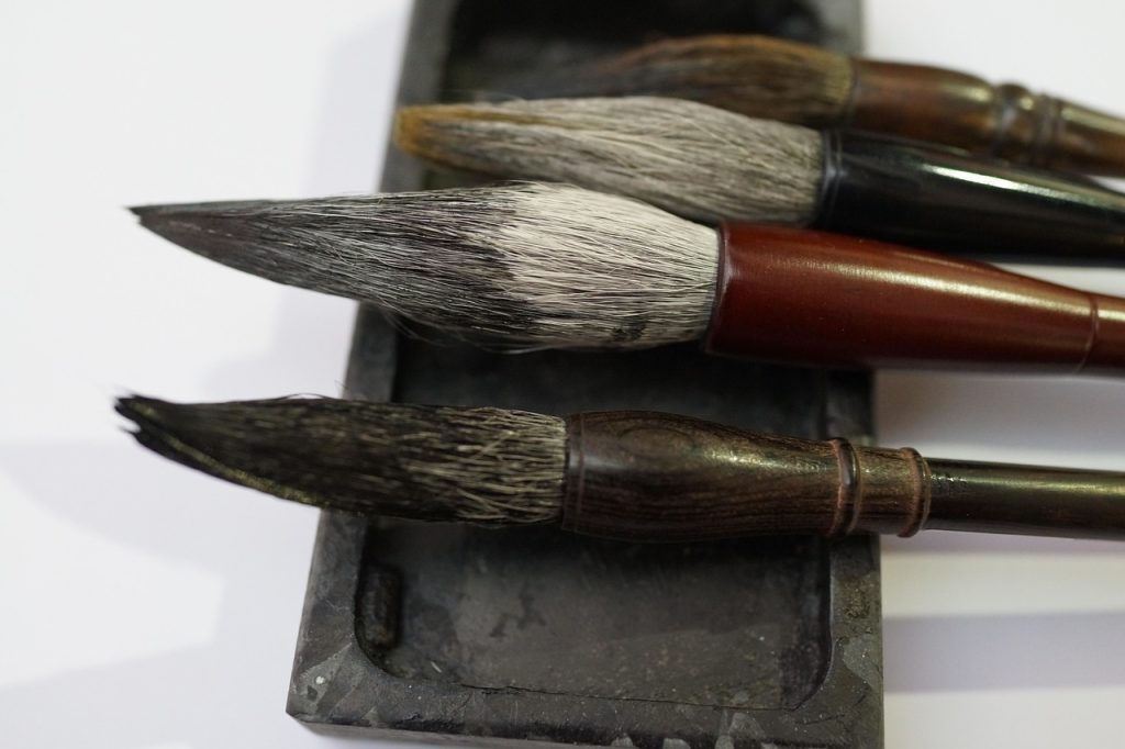 Brush and ink, the tools of the scholarly tradition the Manchus embraced.