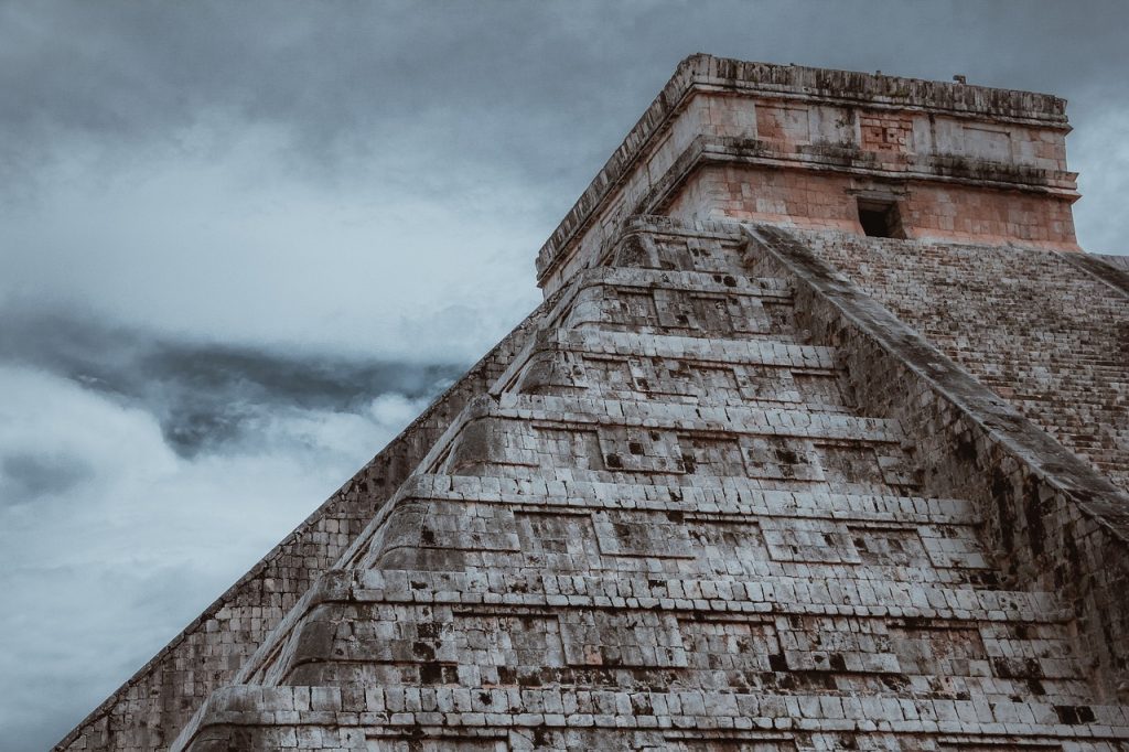 Carved stelae like this one at Coba preserve early forms of Maya writing.
