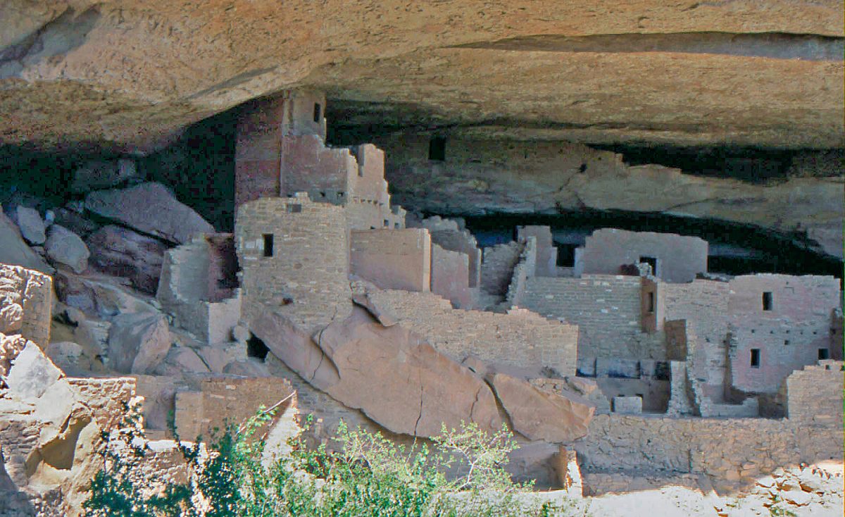 Ancient cliff dwellings built into the sandstone alcoves of Mesa Verde