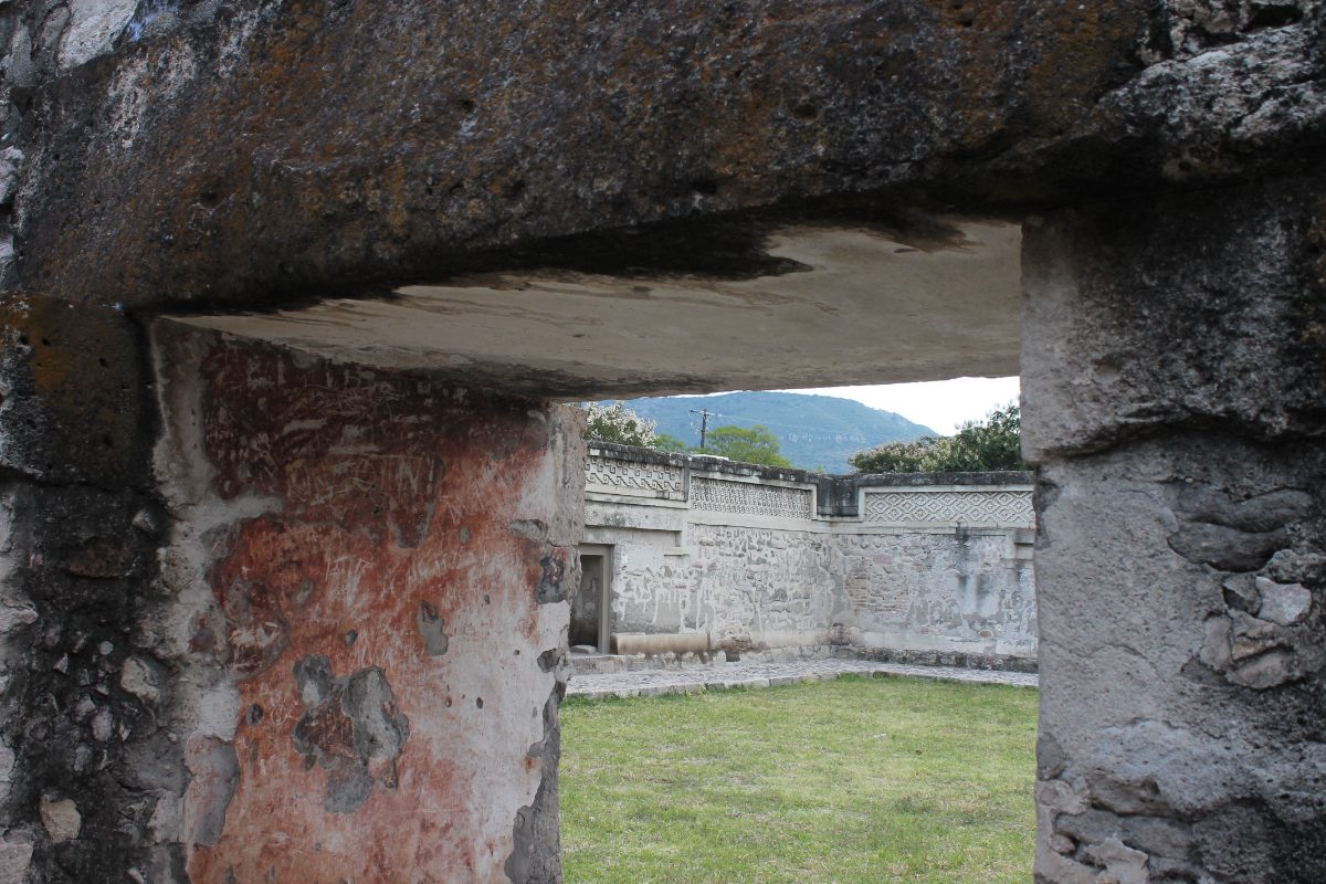 Stone passageway leading into a patio at the Mitla archaeological site