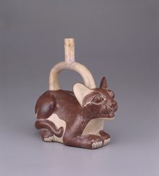 A Moche ceramic vessel shaped like a puma, held at the Larco Museum