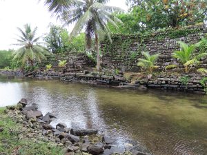 A quiet canal winding between islets at Nan Madol