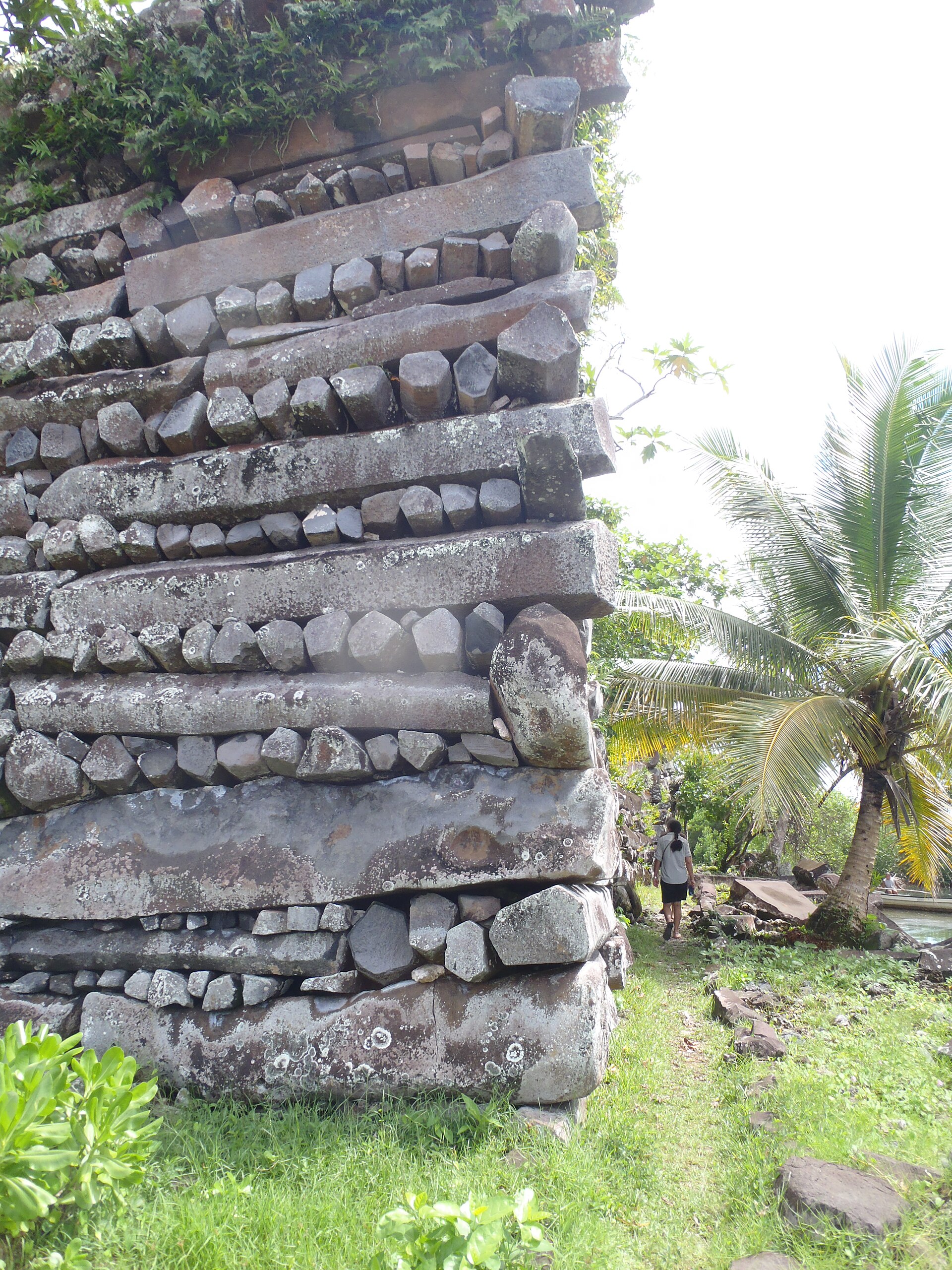 Massive basalt columns stacked into a wall. Building on this scale required a society able to organise vast, sustained labour.