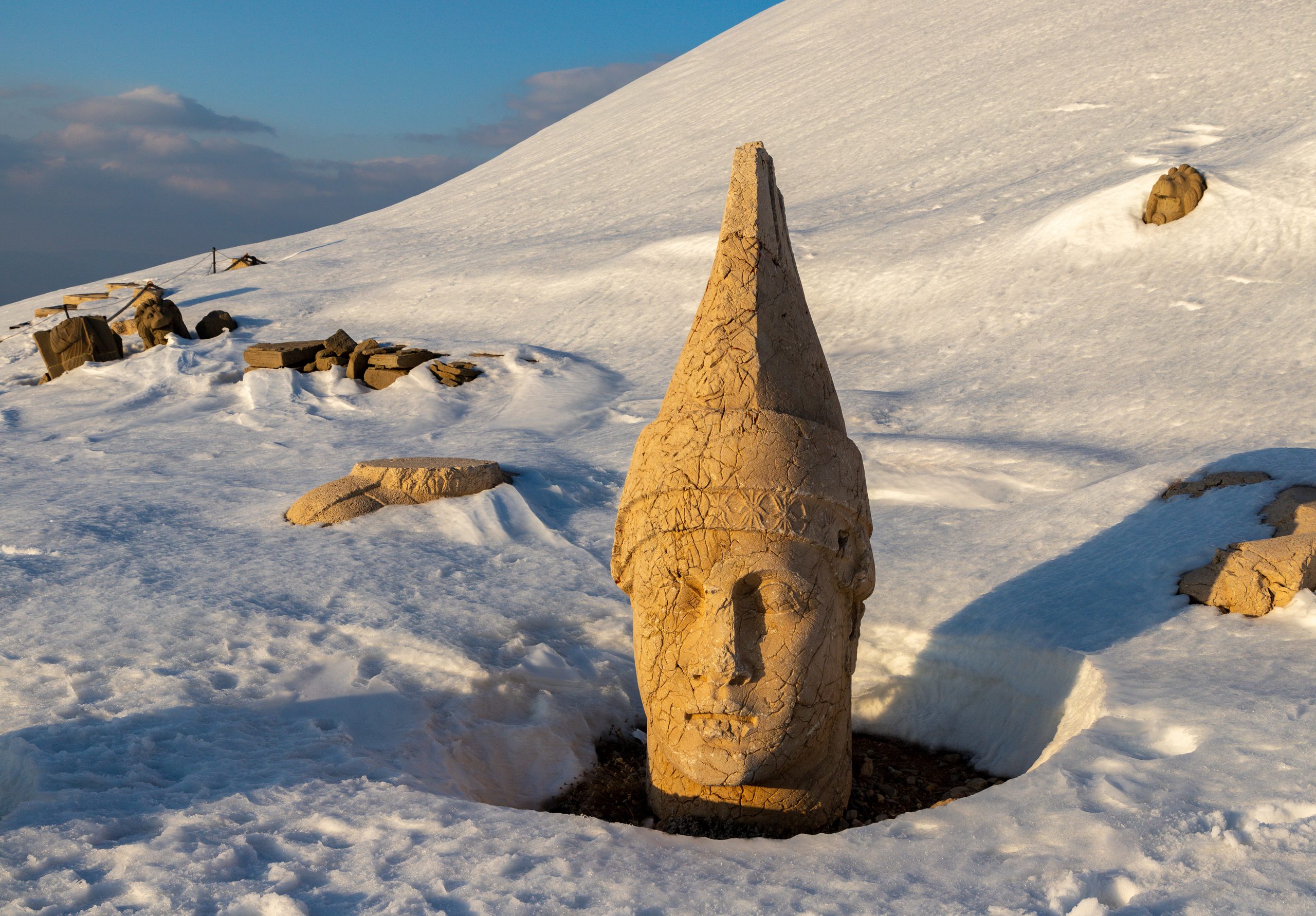 The head of the god Apollo among the colossal statues of Nemrut