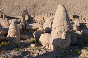The huge heads of Antiochus I and Zeus lying on the terrace