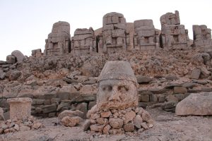 The illuminated statues of Mount Nemrut National Park at dusk