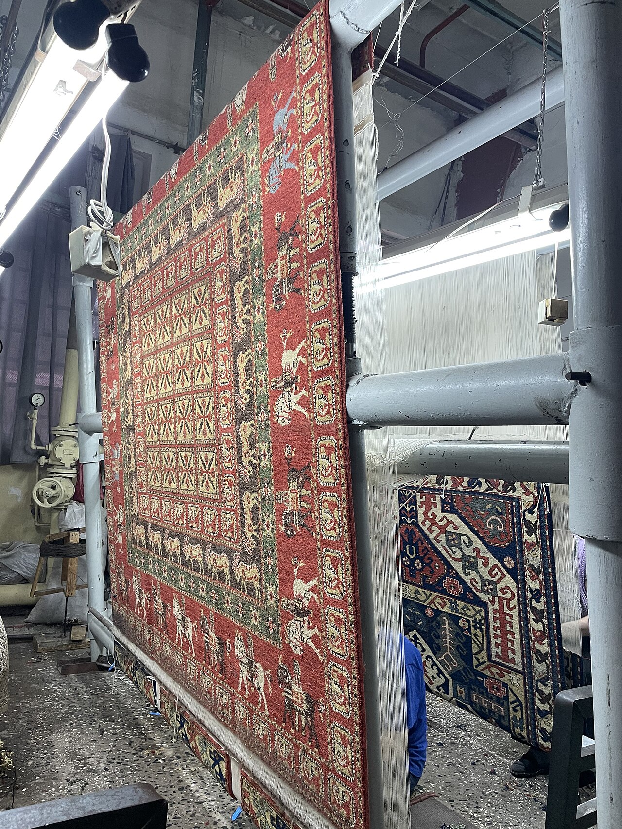 One of the restored samples of the Pazyryk carpet by the Armenian Megerian Carpet company.jpg