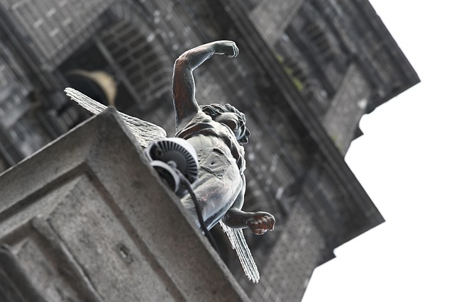An angel statue inside a Mexican cathedral, reflecting centuries of Catholic presence in Otomi communities
