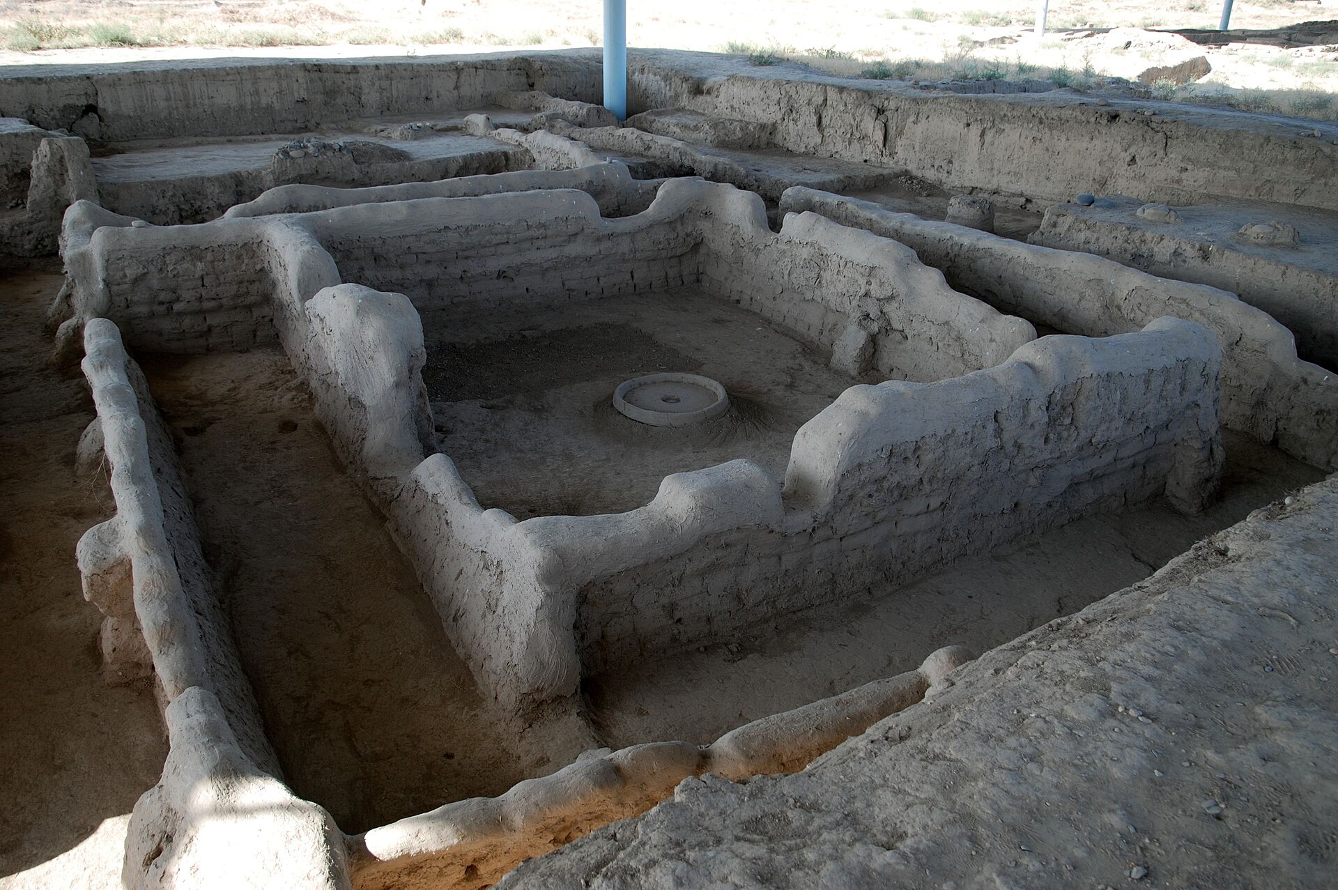 House foundations and wall lines mapped out across one of the excavation areas.