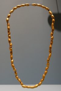 Necklace of stone and shell beads found at Sarazm