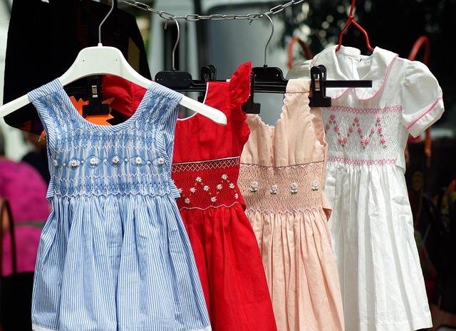 Traditional embroidered dresses at a Mexican market, part of everyday community and commercial life