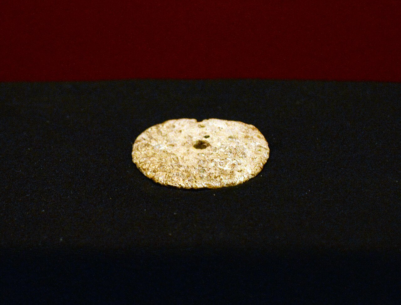 Disk. Mammoth ivory. Sungir site.The building of the formet provincial administration – Palaty. Vladimir.
