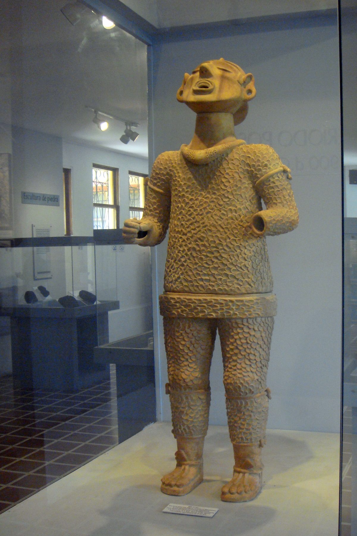 Statue of the deity Xipe Totec found at Tazumal, showing central Mexican influence