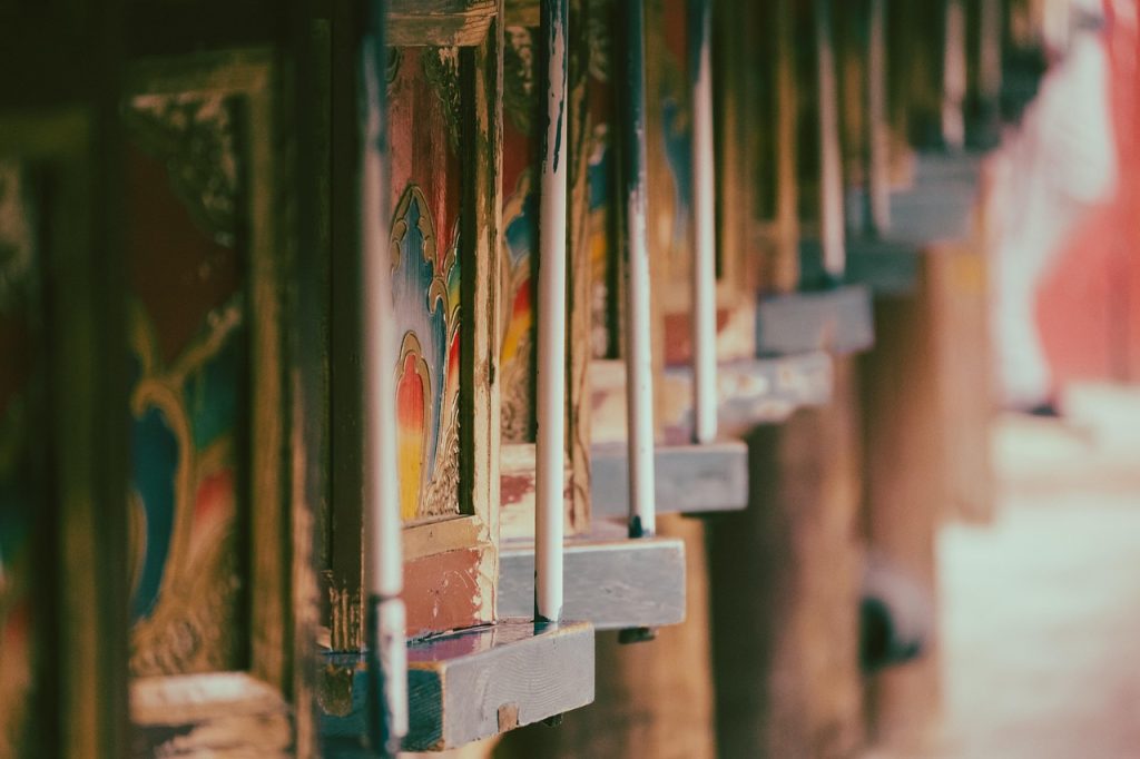 The prayer wheel, spun to release the sacred words within.