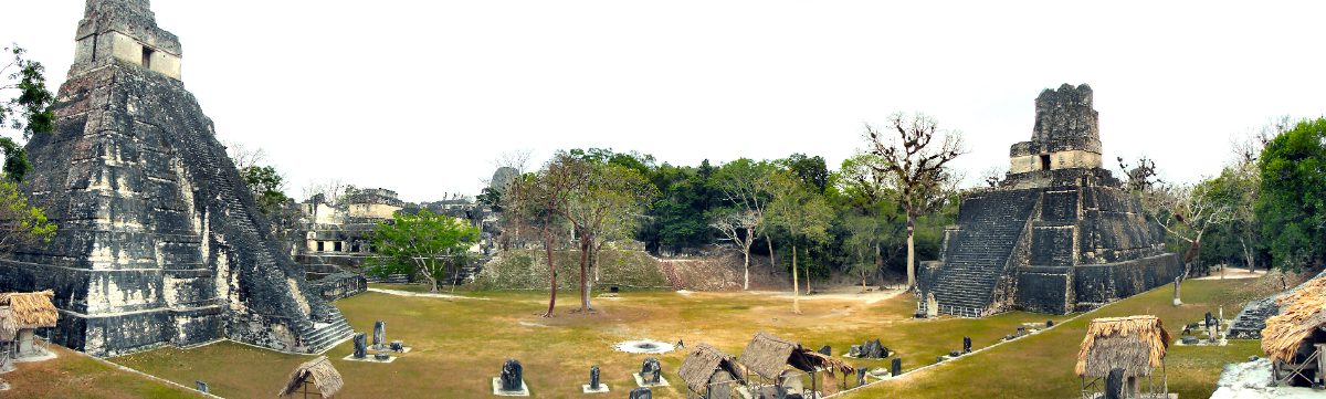Panoramic view of the Great Plaza at Tikal with Temple I and Temple II in Guatemala