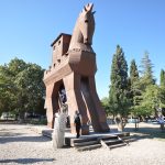 Ruins and reconstructed wooden horse at the Troy archaeological site