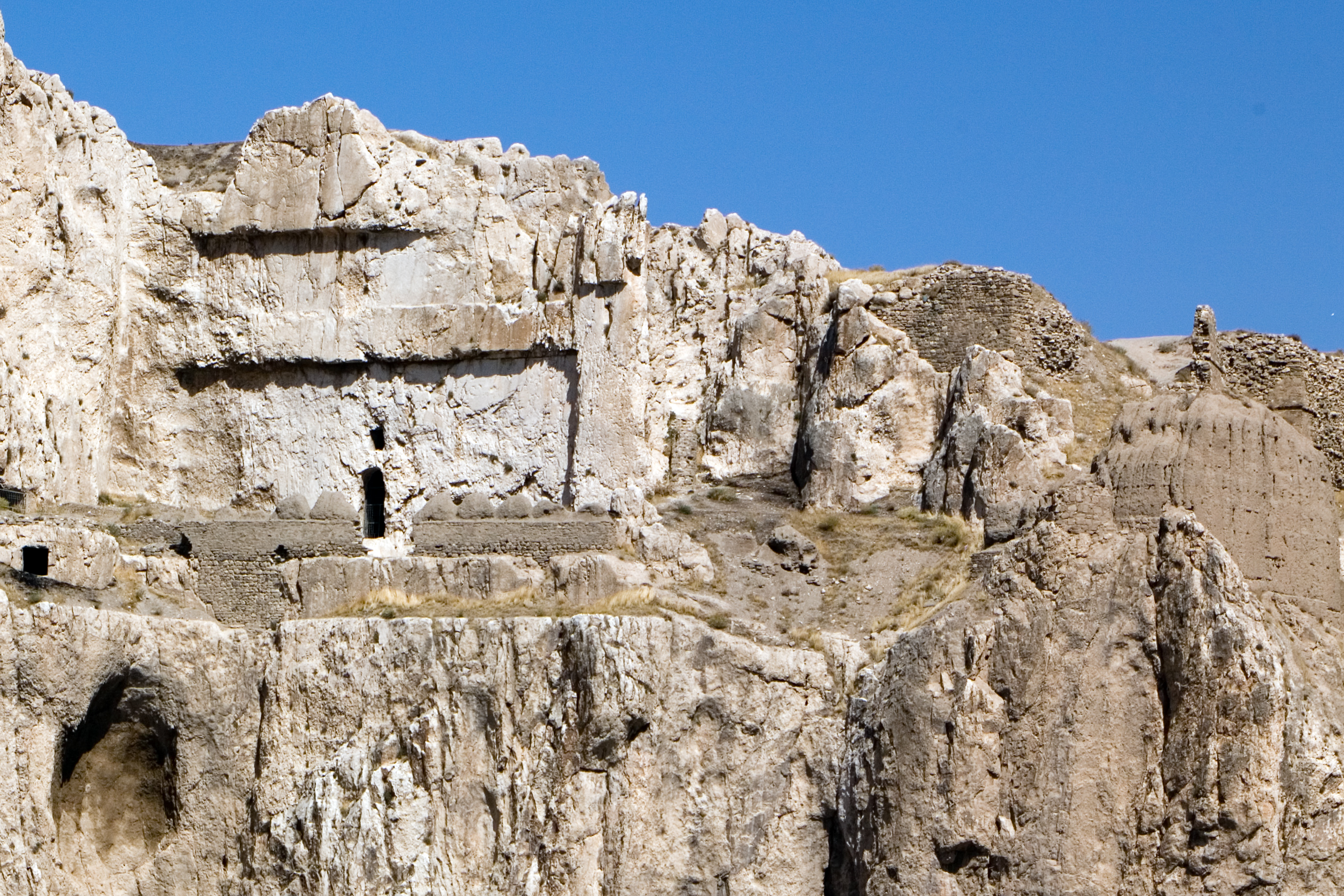 Chambers and openings cut into the living rock of Tushpa