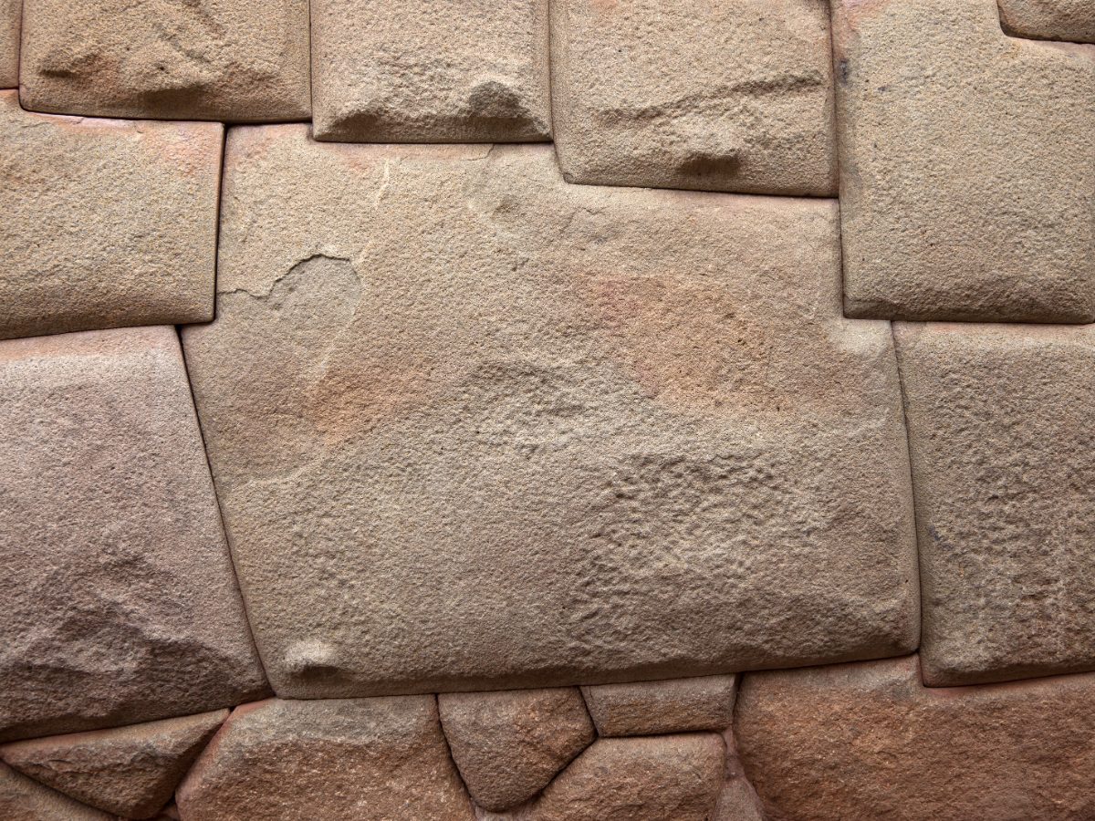 The famous twelve-angled stone set into an Inca wall in Cusco