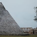 Pyramid of the Magician rising above the Uxmal archaeological site in Yucatan Mexico