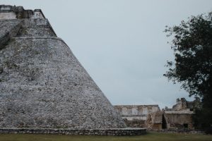 Pyramid of the Magician rising above the Uxmal archaeological site in Yucatan Mexico