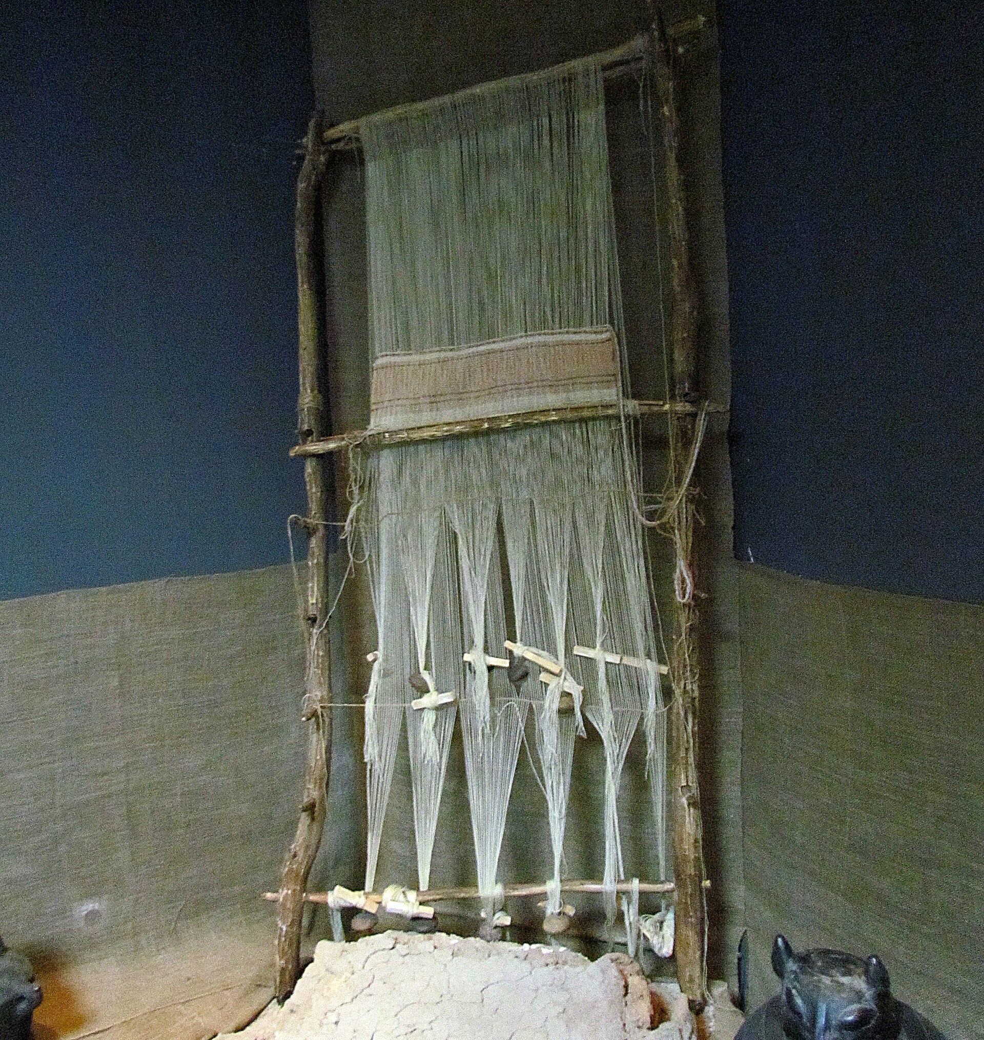 A reconstruction of a Neolithic warp-weighted loom of the kind used in Vinča homes