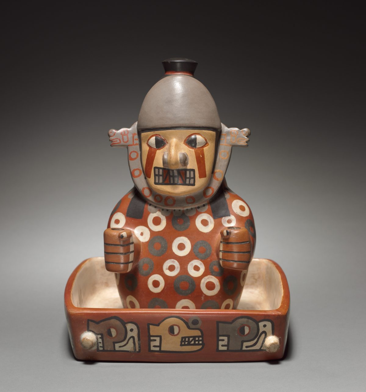 Wari culture figure in a litter, Pachacamac style sculpture