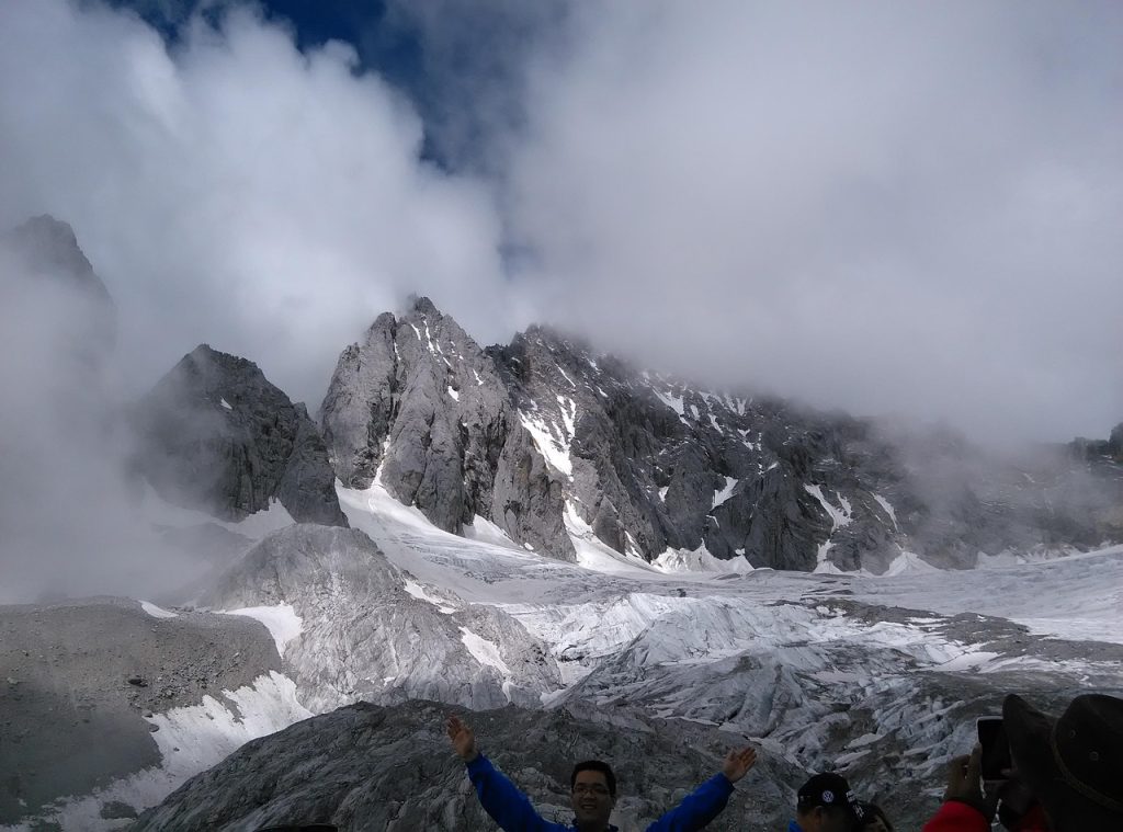 Snow peaks and deep valleys mark the Yi homeland of the southwest.