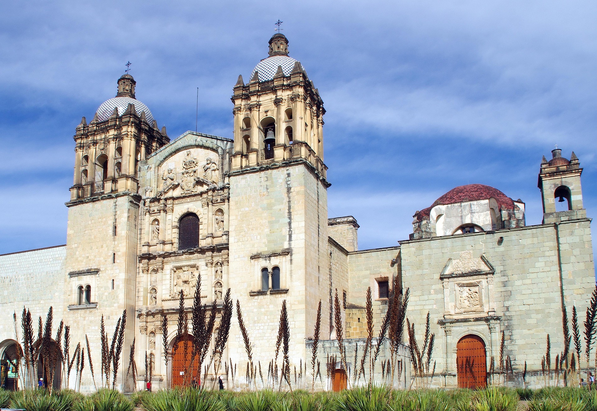A colonial-era cathedral forecourt in Oaxaca, where old beliefs blended with new ones