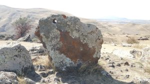 A basalt standing stone at Zorats Karer pierced by a smooth bored hole