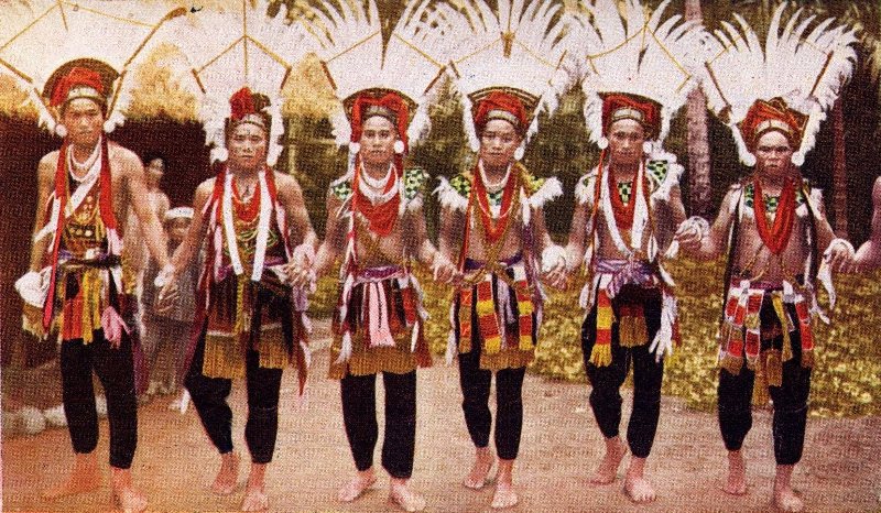 Amis people performing a group dance, central to their harvest festival