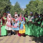 A group in Tatar national costume, the dress shared by the Tatars of China