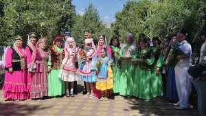 A group in Tatar national costume, the dress shared by the Tatars of China