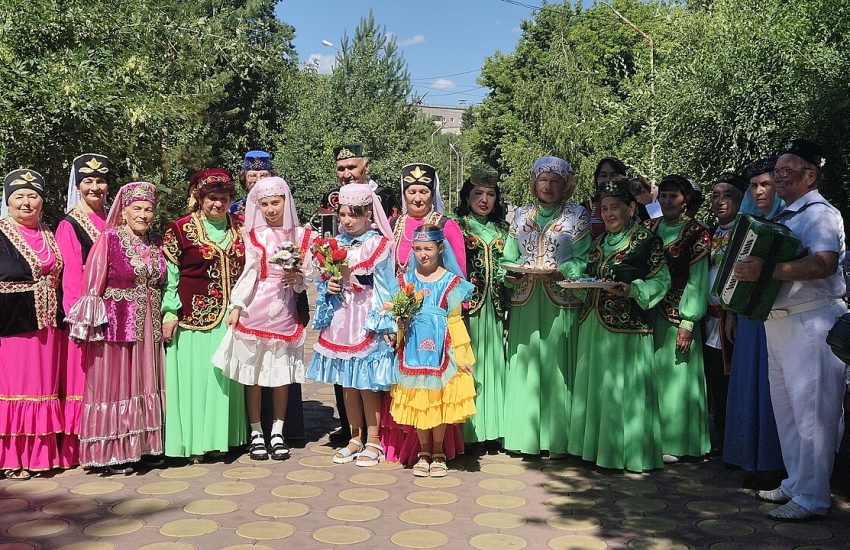 A group in Tatar national costume, the dress shared by the Tatars of China